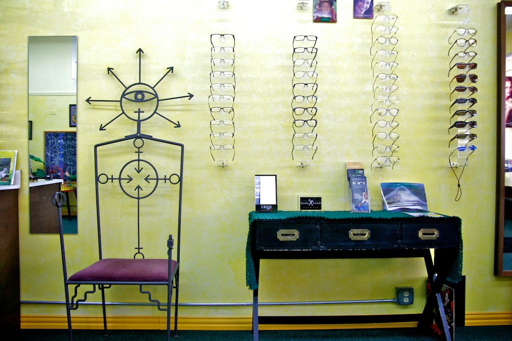 Custom metal chair with sun decoration.